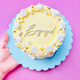 Engaged cake fropper